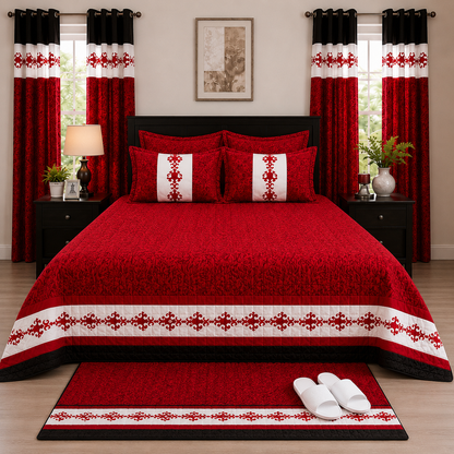 Red and white patterned bedding set on a bed with matching curtains and decor.